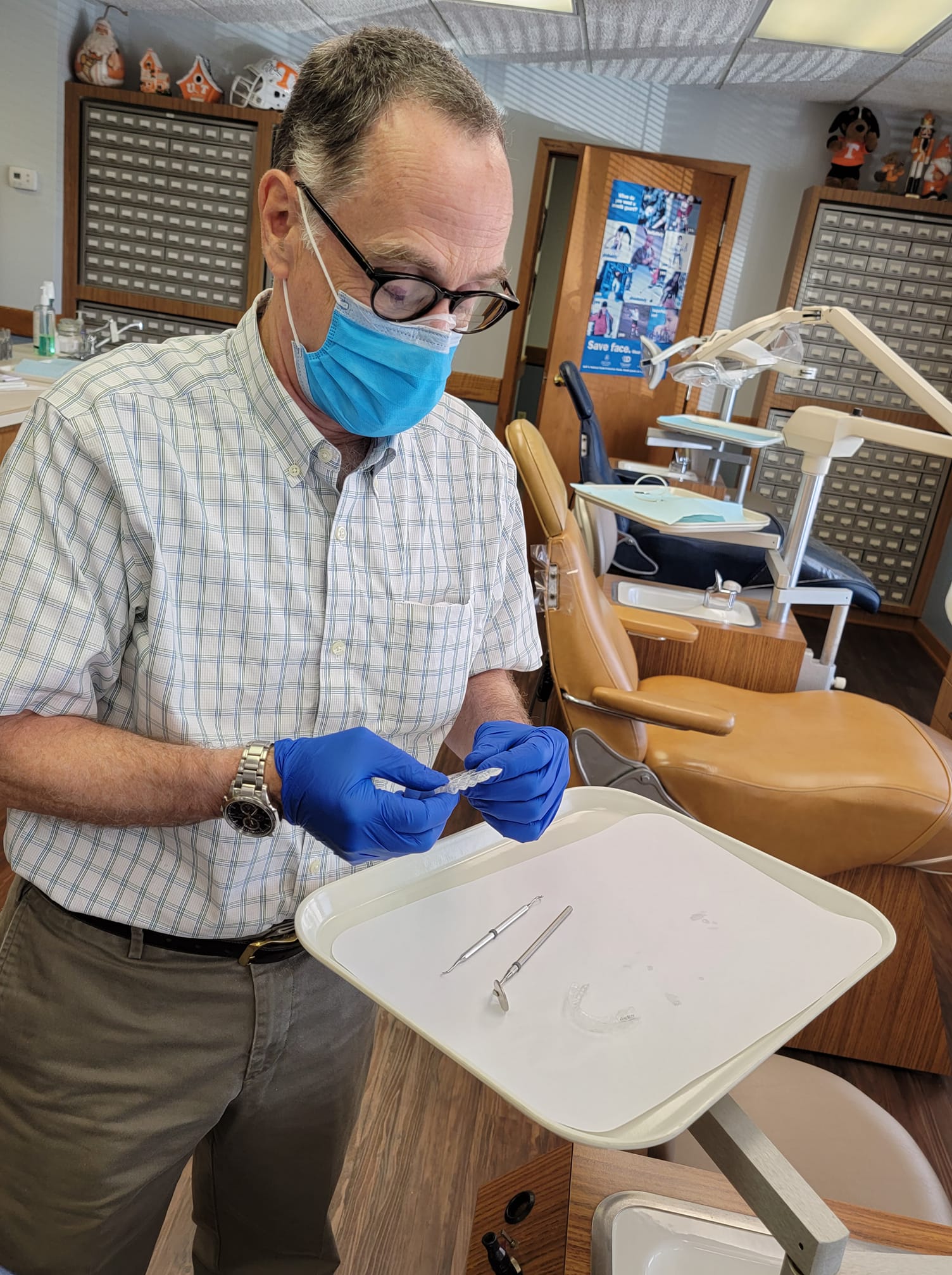Dr. Pryor, Cleveland TN taking a look at clear aligners for a patient.